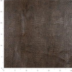 Image of Caiman Whiskey showing scale of leather